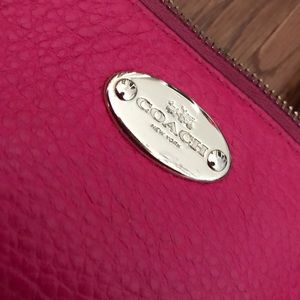 Small pink Coach shoulder bag